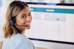 Contact us, call center or portrait of happy woman by computer screen in communications company. F